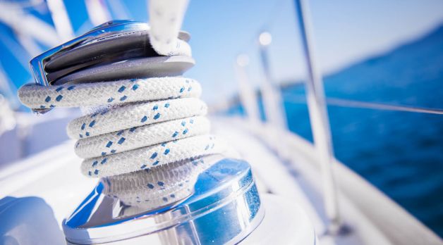 Sailboat winch and rope yacht detail
