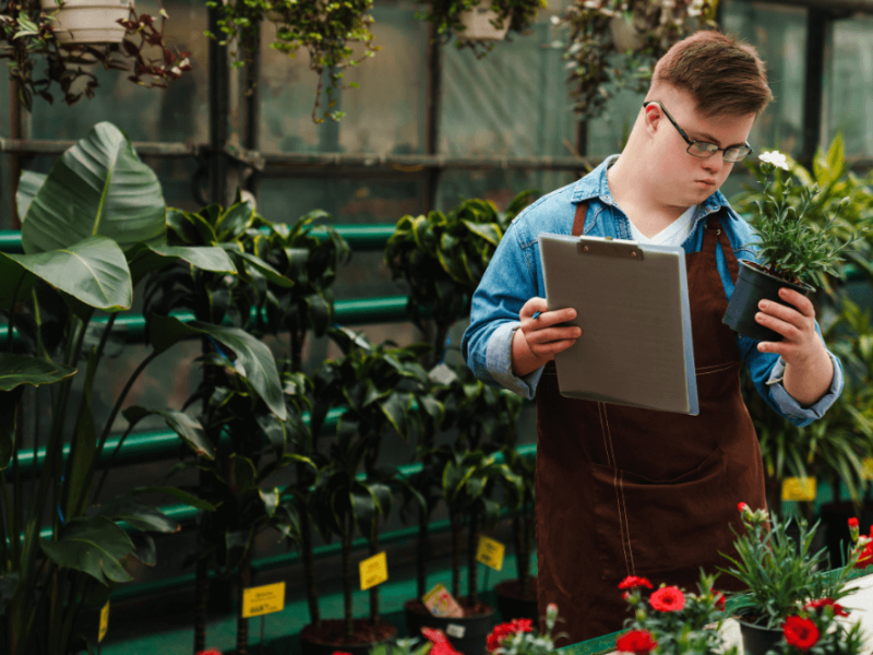 man working in a florist shop