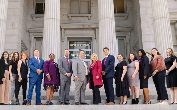 Montagna Law Virginia Law Firm Team standing on the steps of the Norfolk courthouse