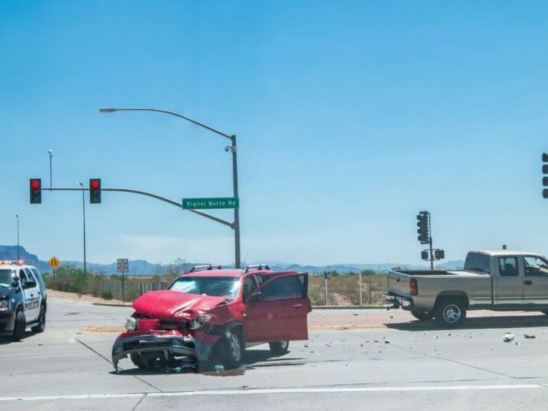 Red SUV caught in a Blind Intersection head-on crash.