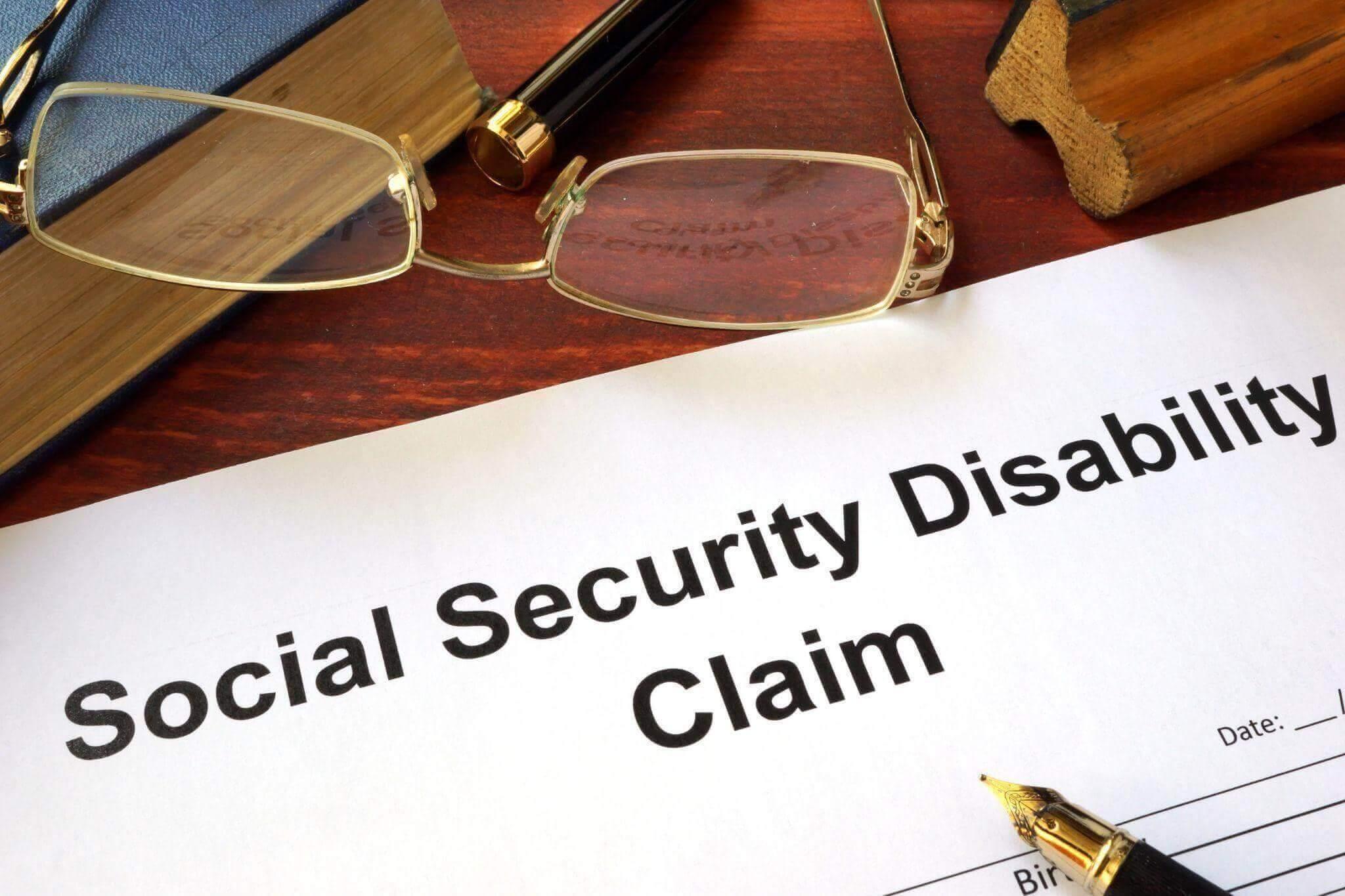 Social security disability claim document on a desk