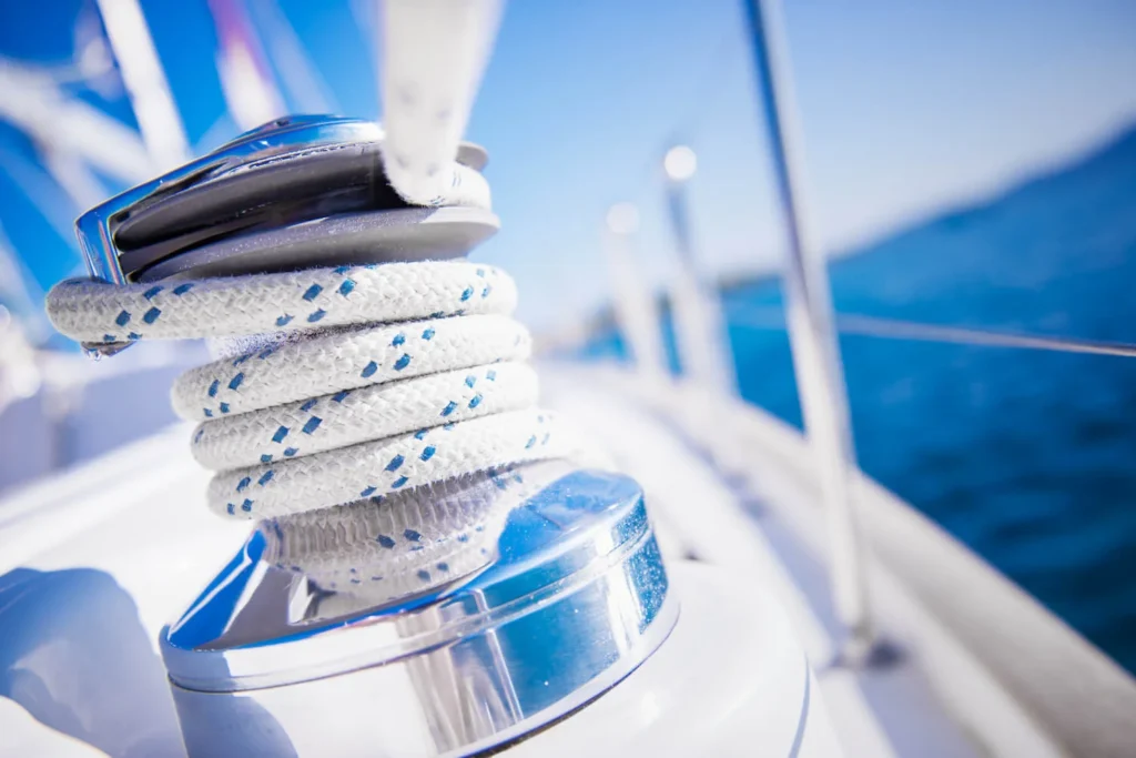 Sailboat winch and rope yacht detail