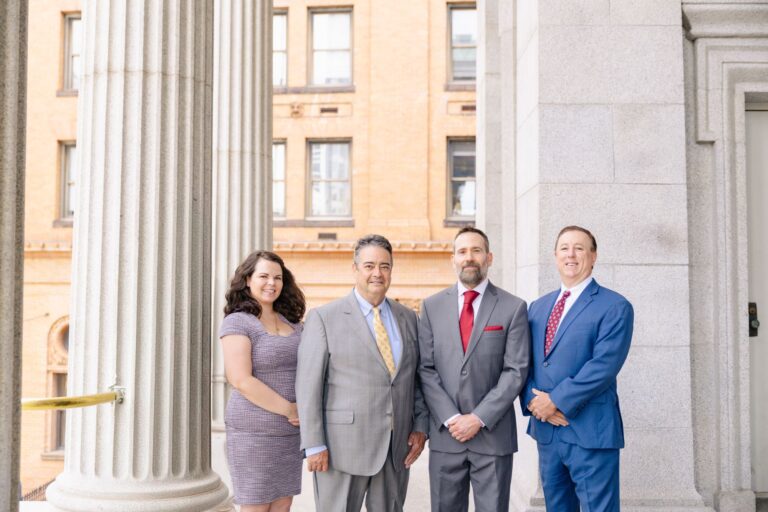 Samantha Bull, Lance Jackson, Jon Montagna and Tony Montagna of Montagna Law at the courthouse in Norfolk